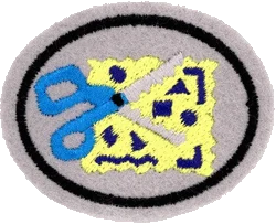 Insignia de la especialidad Álbum de recortes (FL)