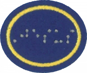 Insignia de la especialidad Braille (División Norteamericana)