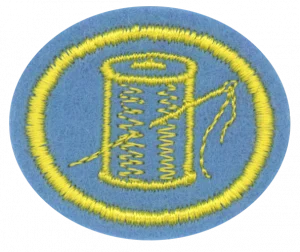 Insignia de la especialidad Trabajos de aguja